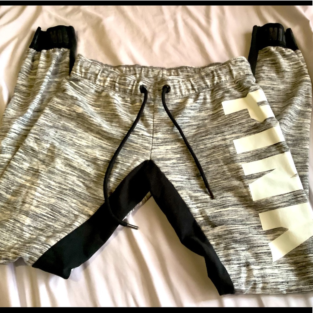 Pink slightly worn joggers.